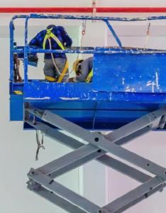 Employee working on lift